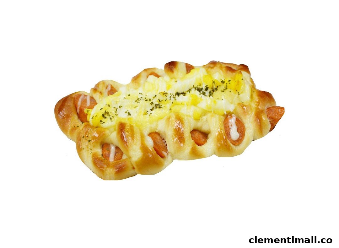 A golden-baked sausage bun topped with melted cheese and herbs.