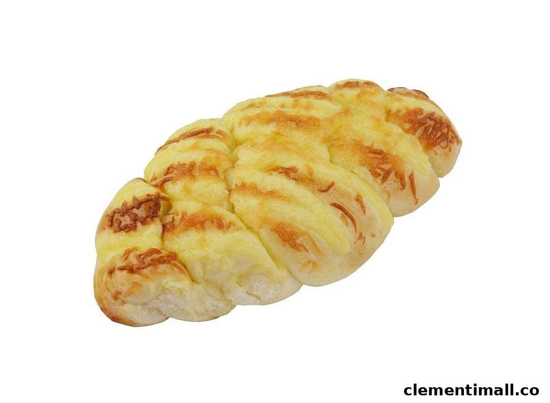 A golden-brown braided bread or bun topped with melted cheese, isolated on a white background.