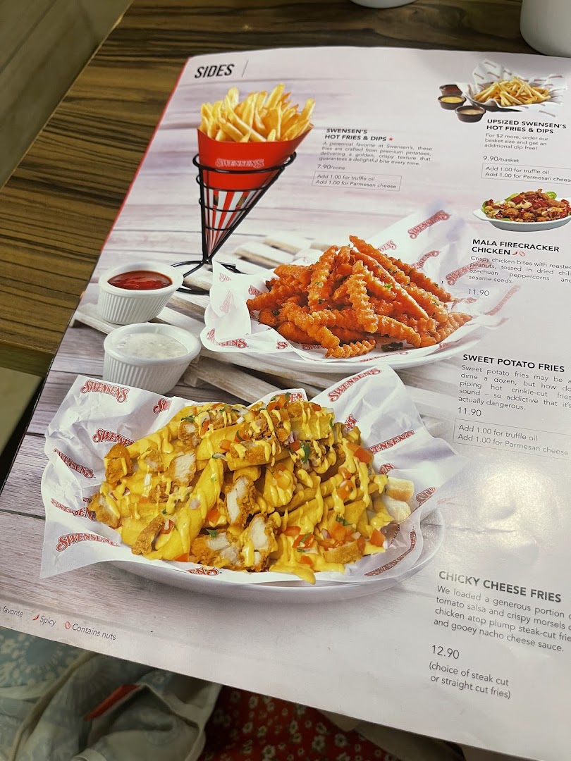 A close-up of Swensen's menu, showcasing various fries and chicken side dishes.