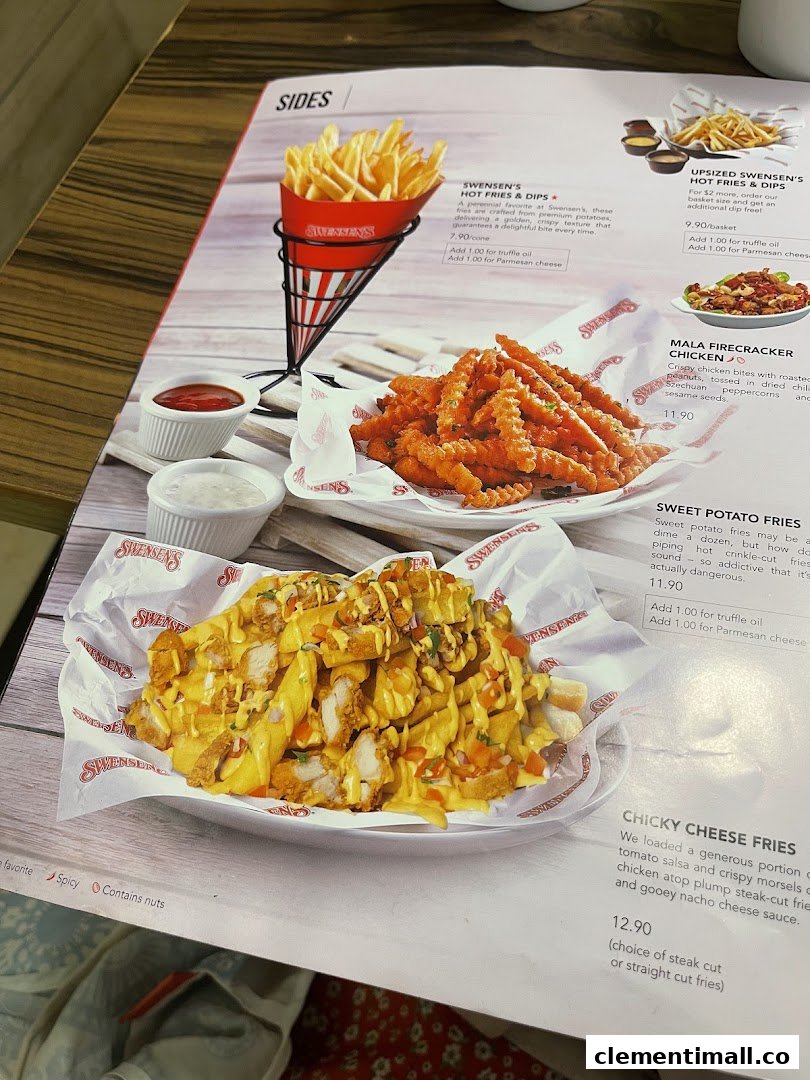 A close-up of Swensen's menu, showcasing various fries and chicken side dishes.