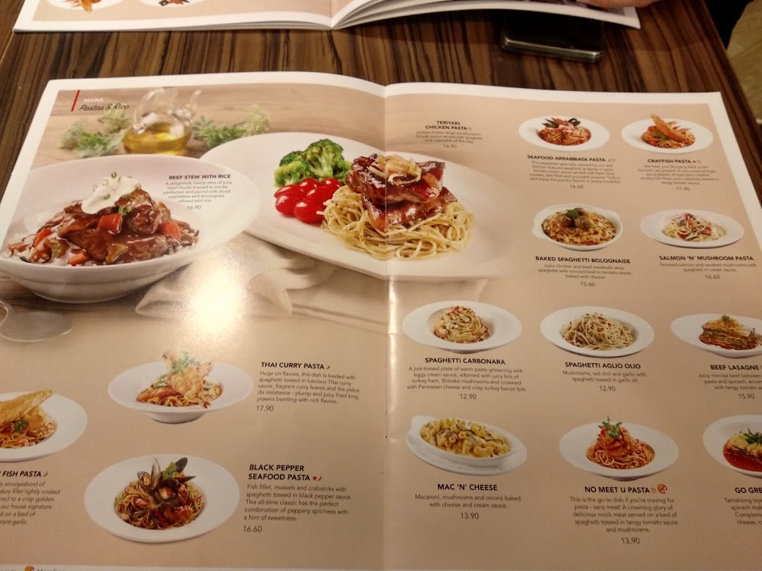 A detailed view of Swensen's menu, showcasing a variety of pasta and rice dishes with descriptions and prices.