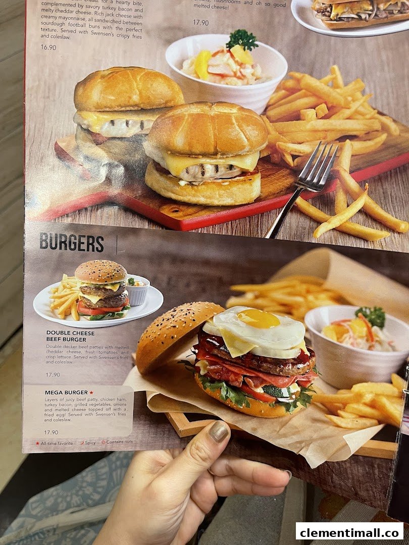 A close-up of Swensen's menu showcasing various burger options with descriptions and prices.