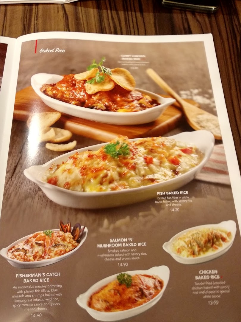 A menu page from Swensen's showcasing a variety of delicious baked rice dishes.