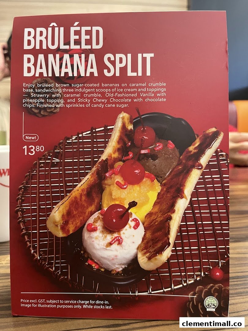 A menu board showcasing Swensen's new Brûléed Banana Split dessert with its description and price.