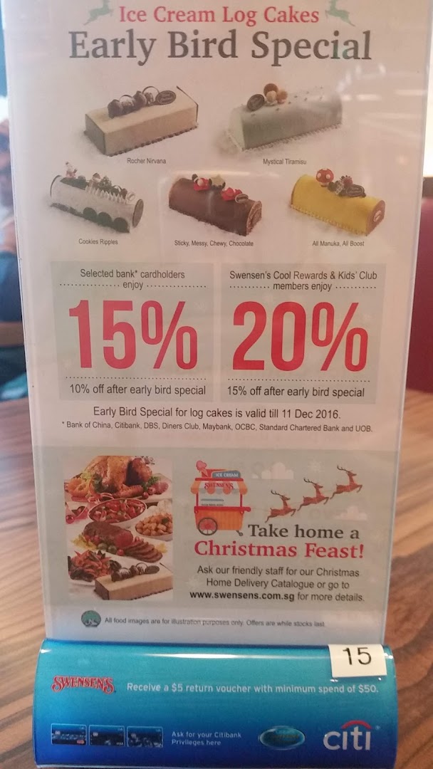 A promotional flyer from Swensen's featuring ice cream log cakes, early bird discounts, and a Christmas feast offer.