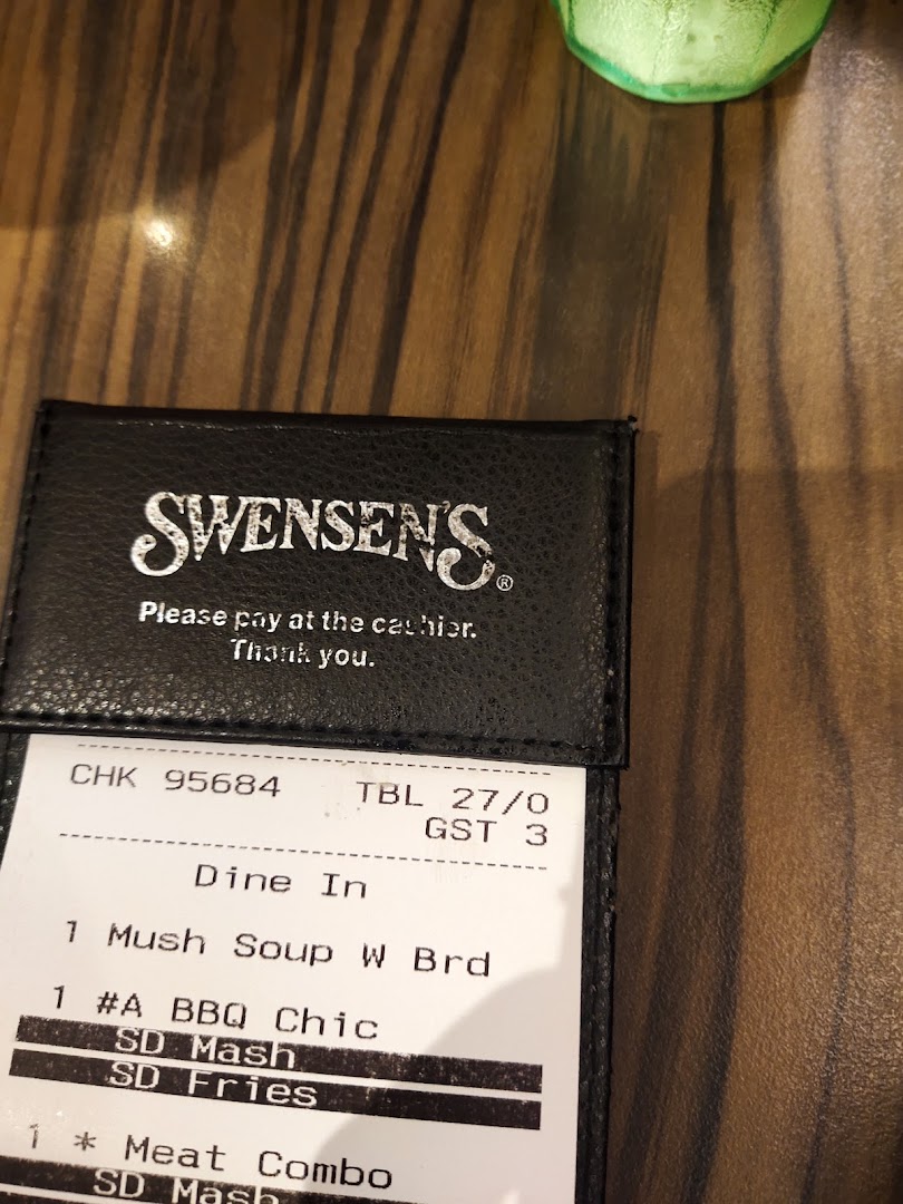 A close-up of a Swensen's restaurant bill showing ordered items like soup, BBQ chicken, and a meat combo.