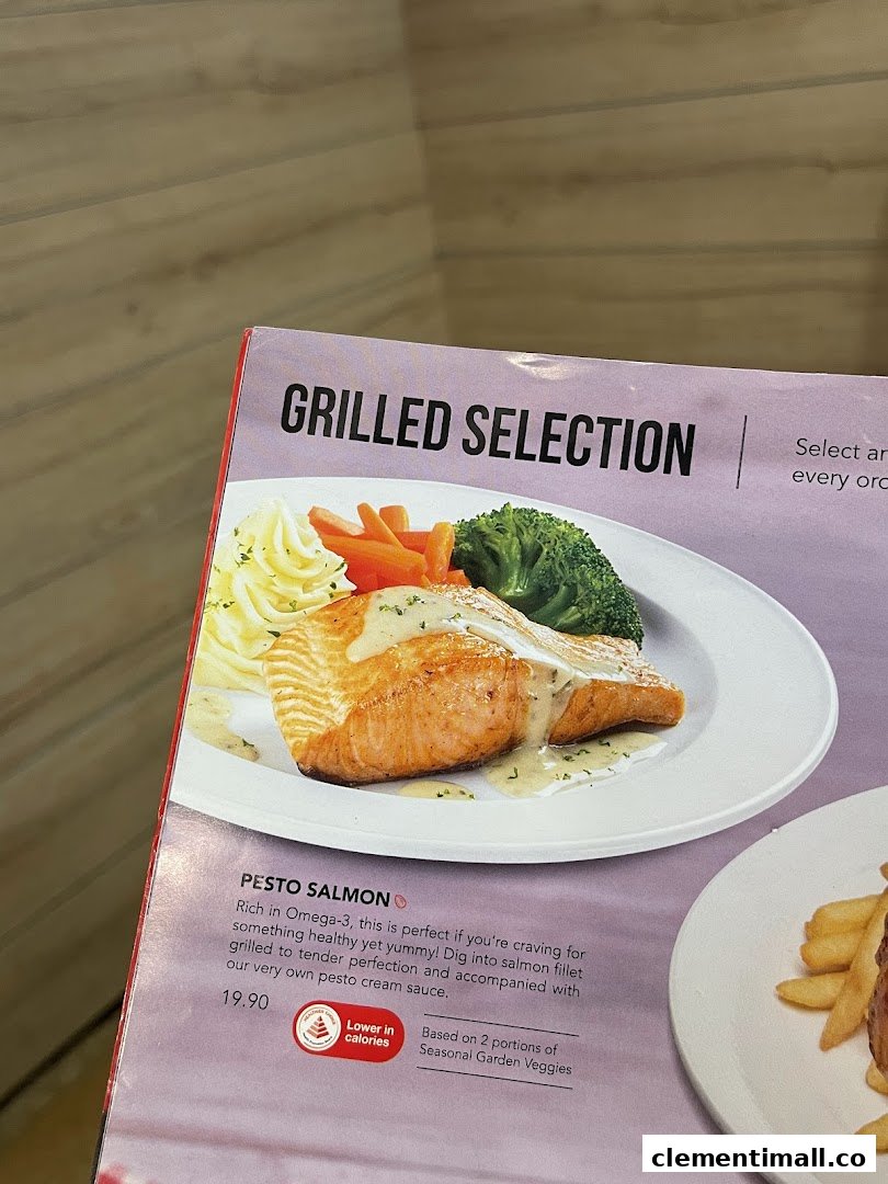 A menu page from Swensen's featuring a delicious Pesto Salmon dish under 'Grilled Selection'.