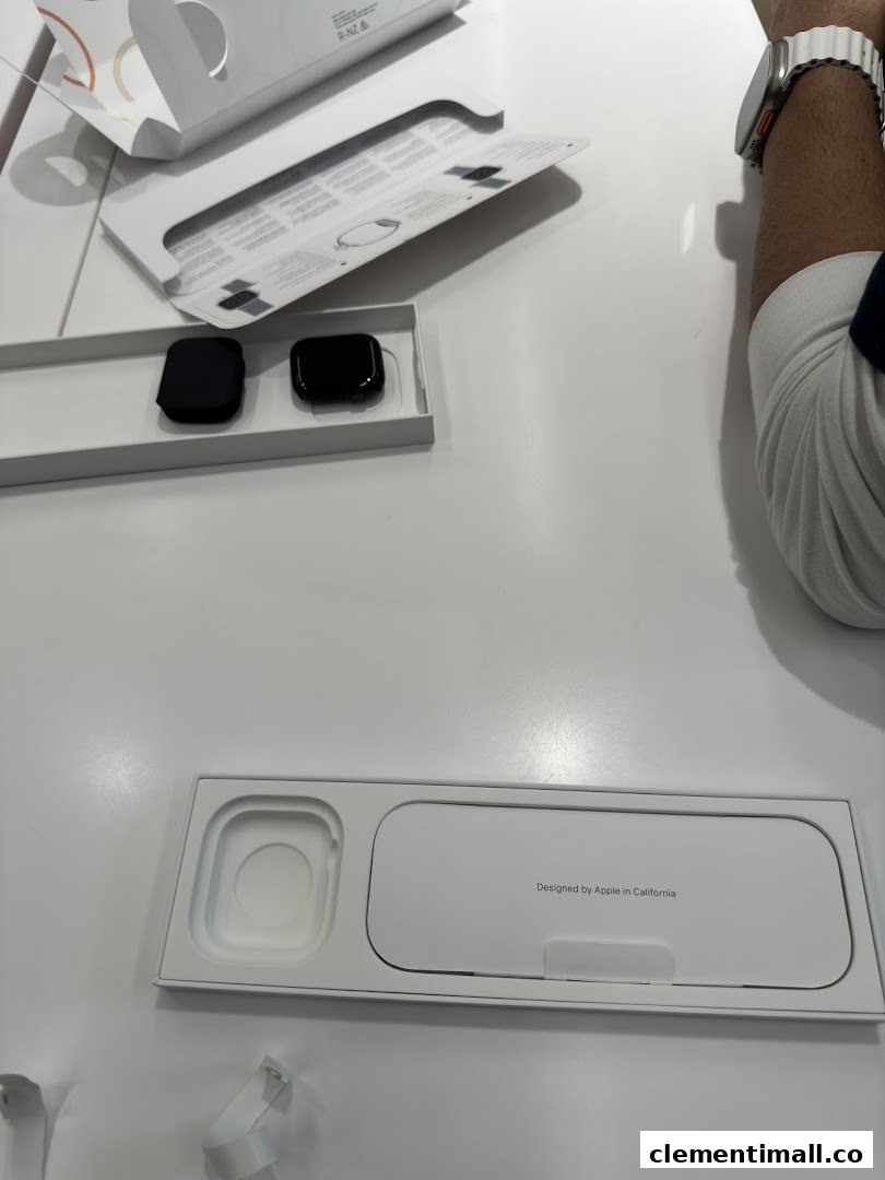 Close-up of Apple Watch products and packaging on a display table at Switch.