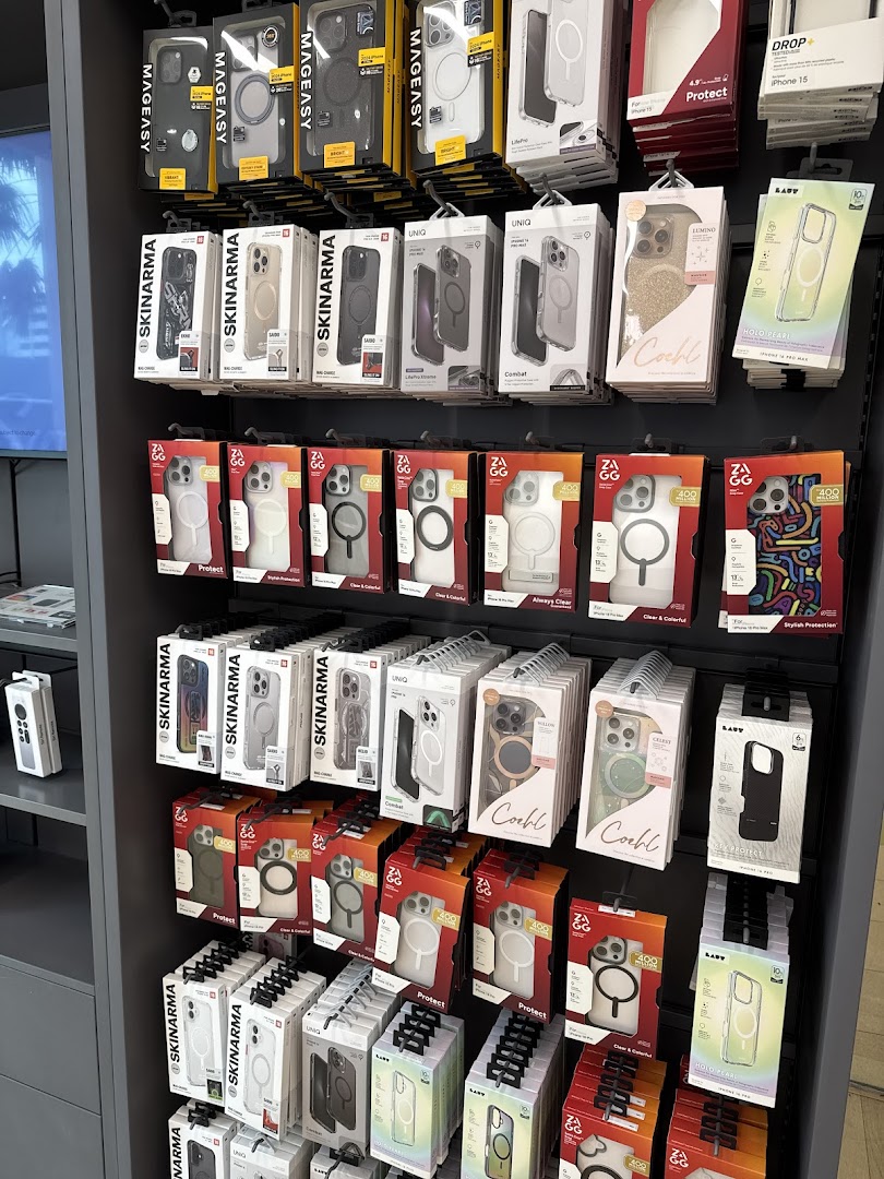 A retail display showcasing a wide variety of phone cases and mobile accessories.