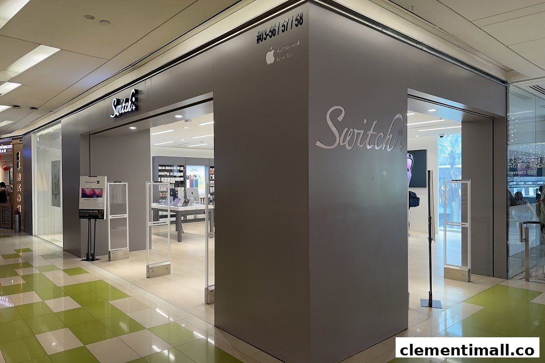 The storefront of Switch+, an Apple Authorized Reseller, showcasing its modern entrance and interior product displays.