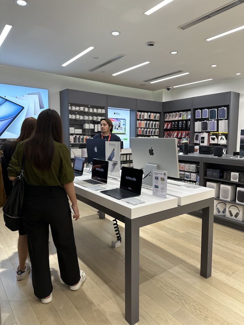 Customers browse Apple products and accessories at Switch, an authorized reseller.
