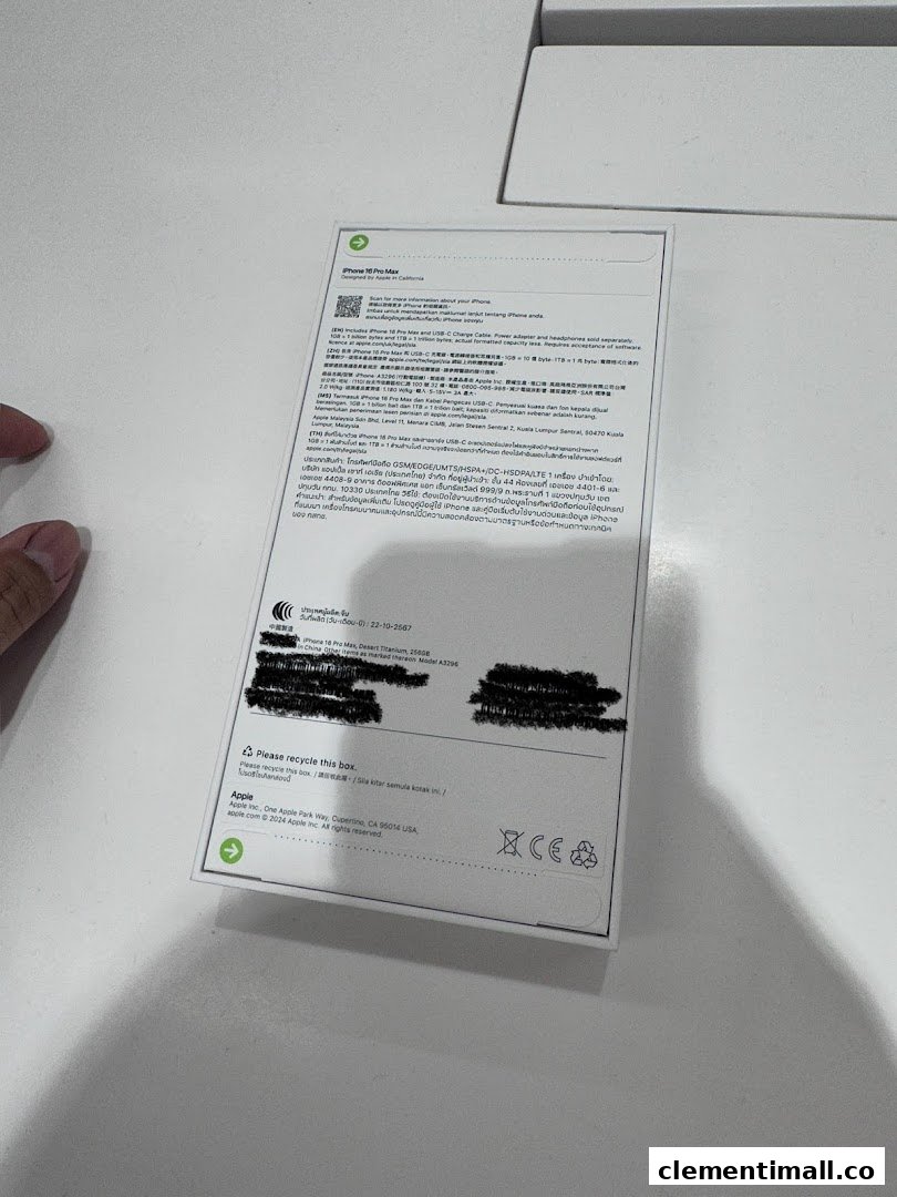 A close-up view of the back of an iPhone 16 Pro Max box, displaying product information and regulatory details.