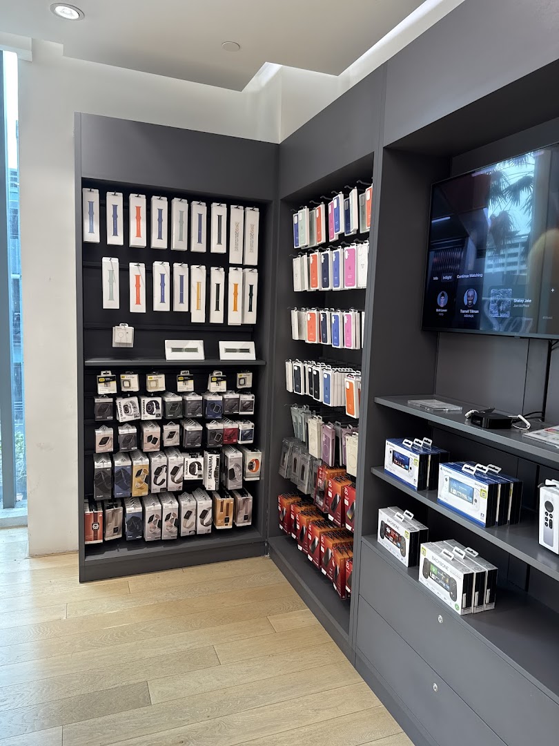 Interior view of Switch store showcasing mobile accessories, watch straps, and gaming gadgets on display.