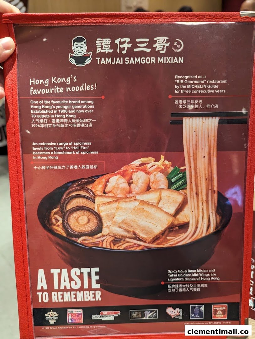 A promotional menu page for TamJai SamGor Mixian, highlighting their signature noodles and brand achievements.