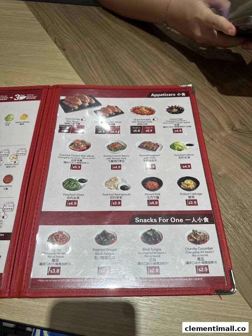 A close-up view of a menu displaying appetizers and snacks with prices.