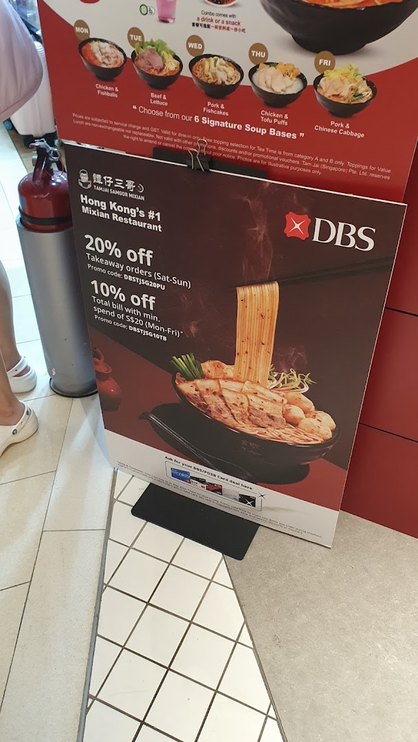 A promotional display board showcasing daily signature mixian dishes and special offers from TamJai SamGor Mixian.