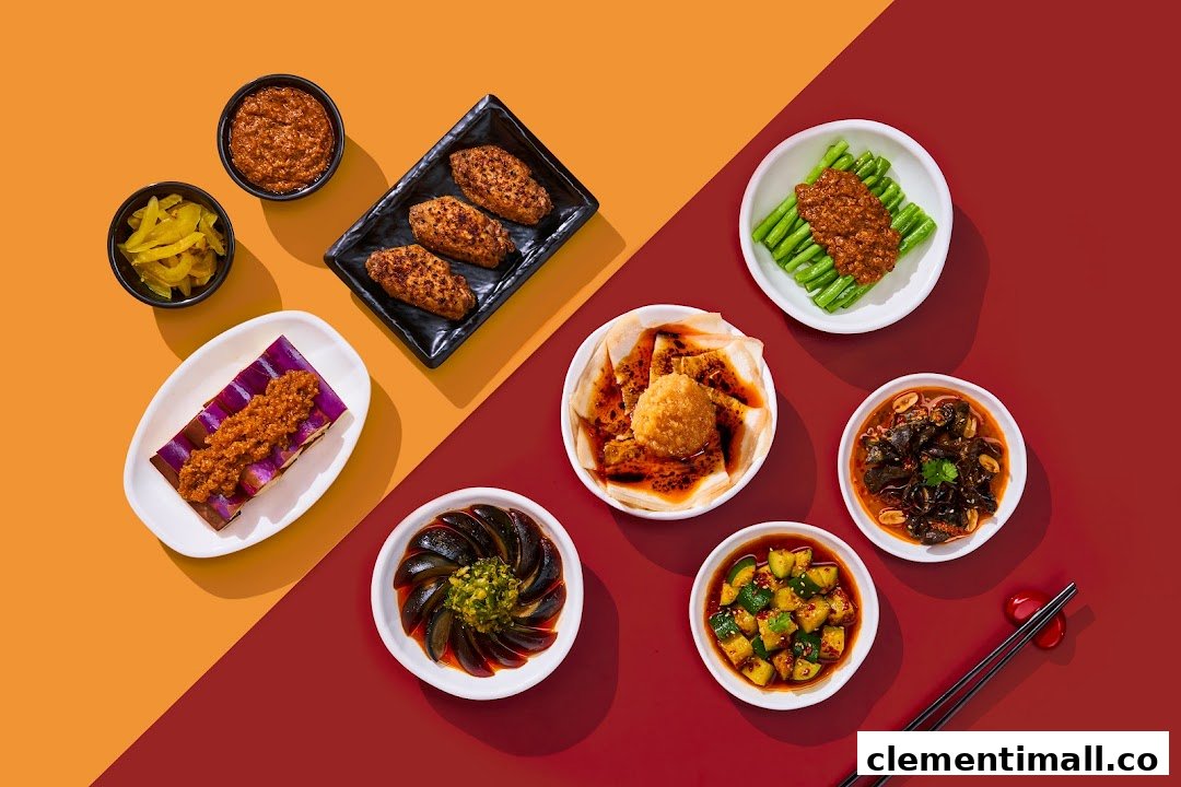 A vibrant flat lay of various spicy and savory Chinese appetizers and side dishes.