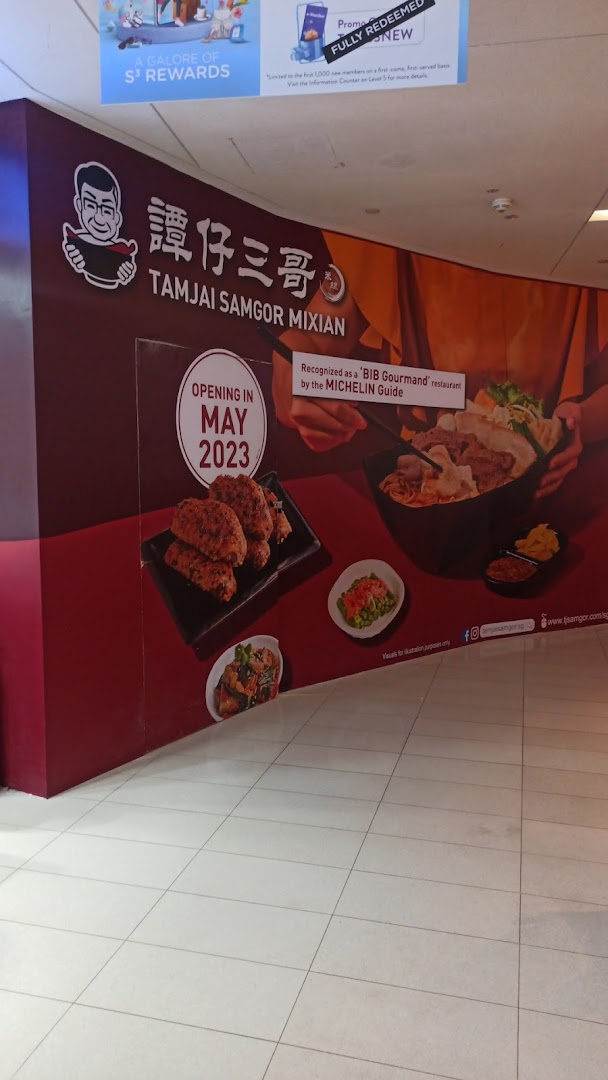 A promotional hoarding for TamJai SamGor Mixian, announcing its May 2023 opening and Michelin recognition.