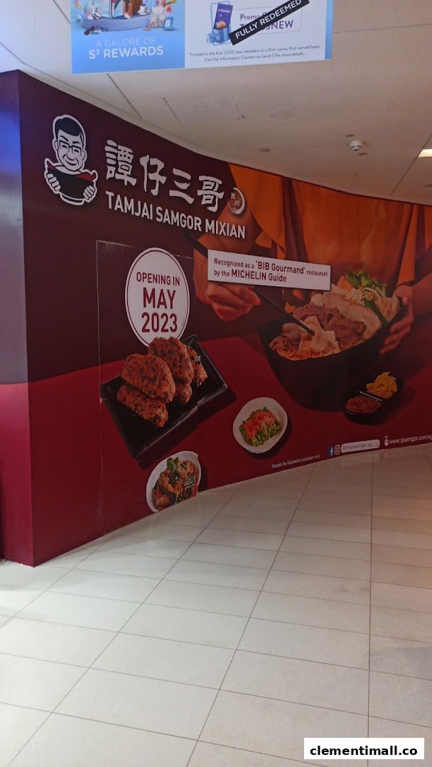 A promotional hoarding for TamJai SamGor Mixian, announcing its May 2023 opening and Michelin recognition.