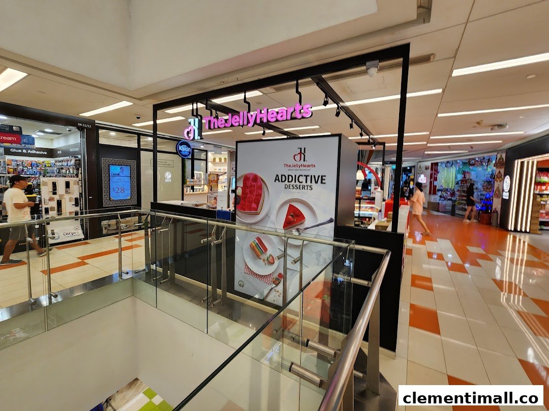 The JellyHearts dessert shop with 'Addictive Desserts' signage, located in a bustling mall corridor.