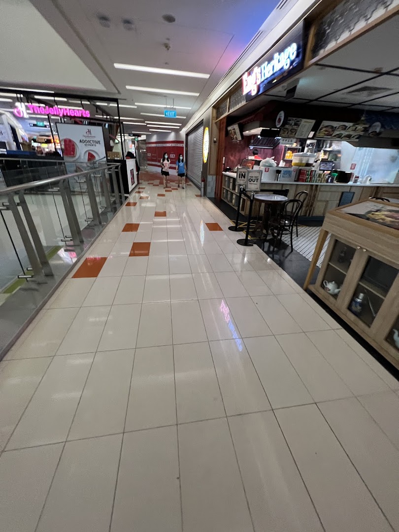 A mall corridor featuring The JellyHearts dessert shop and Eng's Heritage food stall, with shoppers walking by.