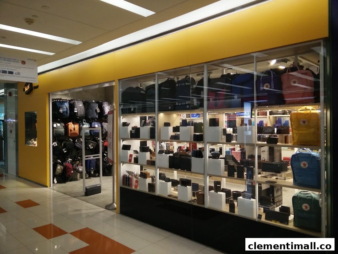 The storefront of The Wallet Shop, showcasing a wide array of wallets, bags, and accessories in its display windows.