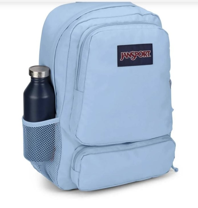 A light blue JanSport backpack with a dark blue water bottle in its side mesh pocket.