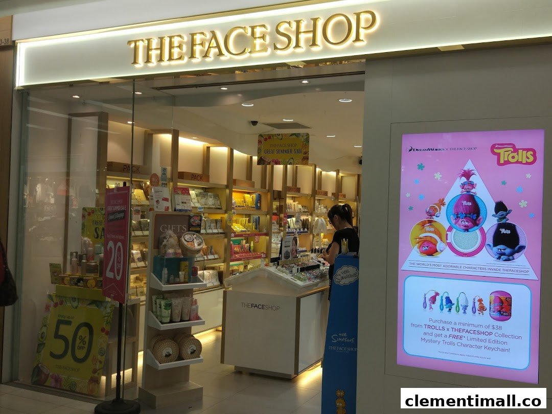 The exterior of THEFACESHOP, showcasing its entrance, logo, and vibrant beauty product displays.