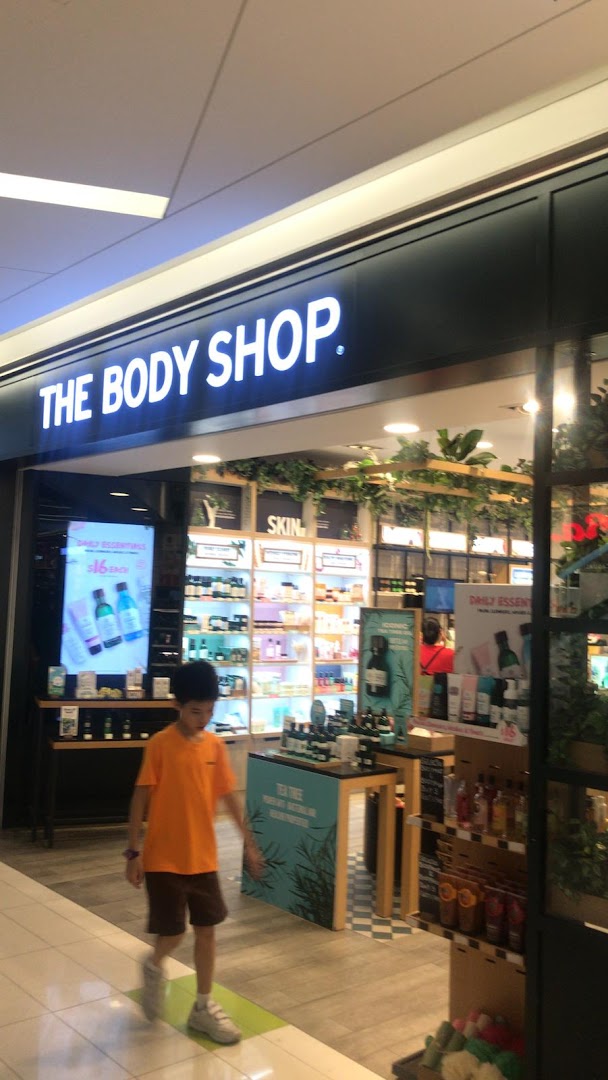 The storefront of The Body Shop, showcasing its natural beauty products and inviting entrance.