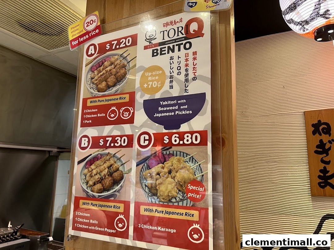 A menu board displaying various bento sets with yakitori and karaage options at TORI-Q.