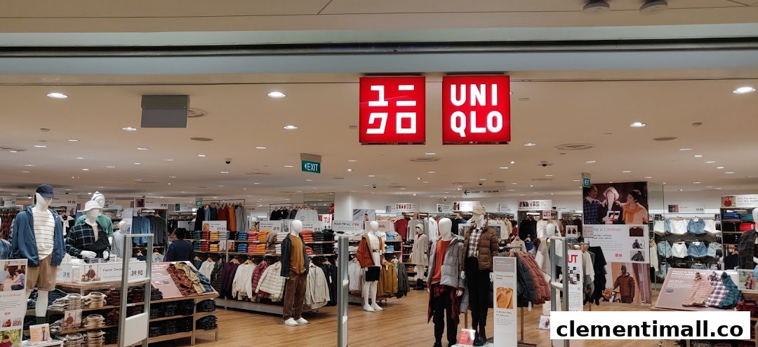 The bright and inviting entrance of UNIQLO at The Clementi Mall, showcasing diverse clothing displays.