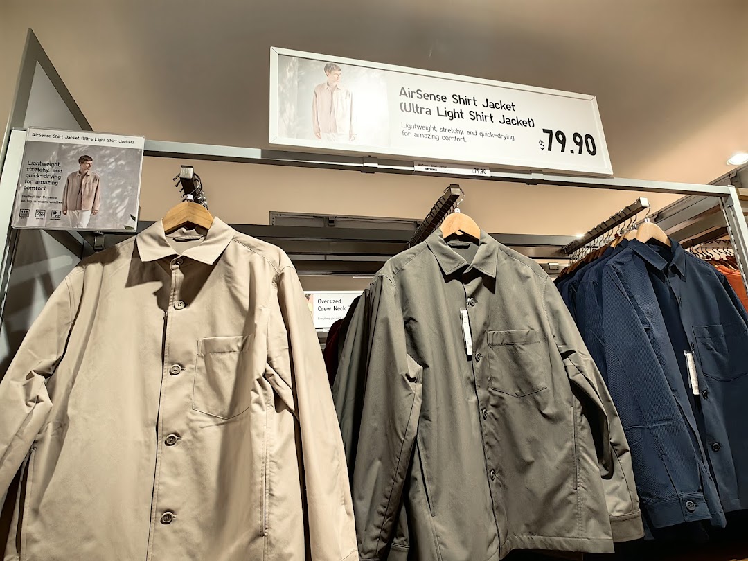 Uniqlo's AirSense Shirt Jackets displayed in-store with a price tag of $79.90.