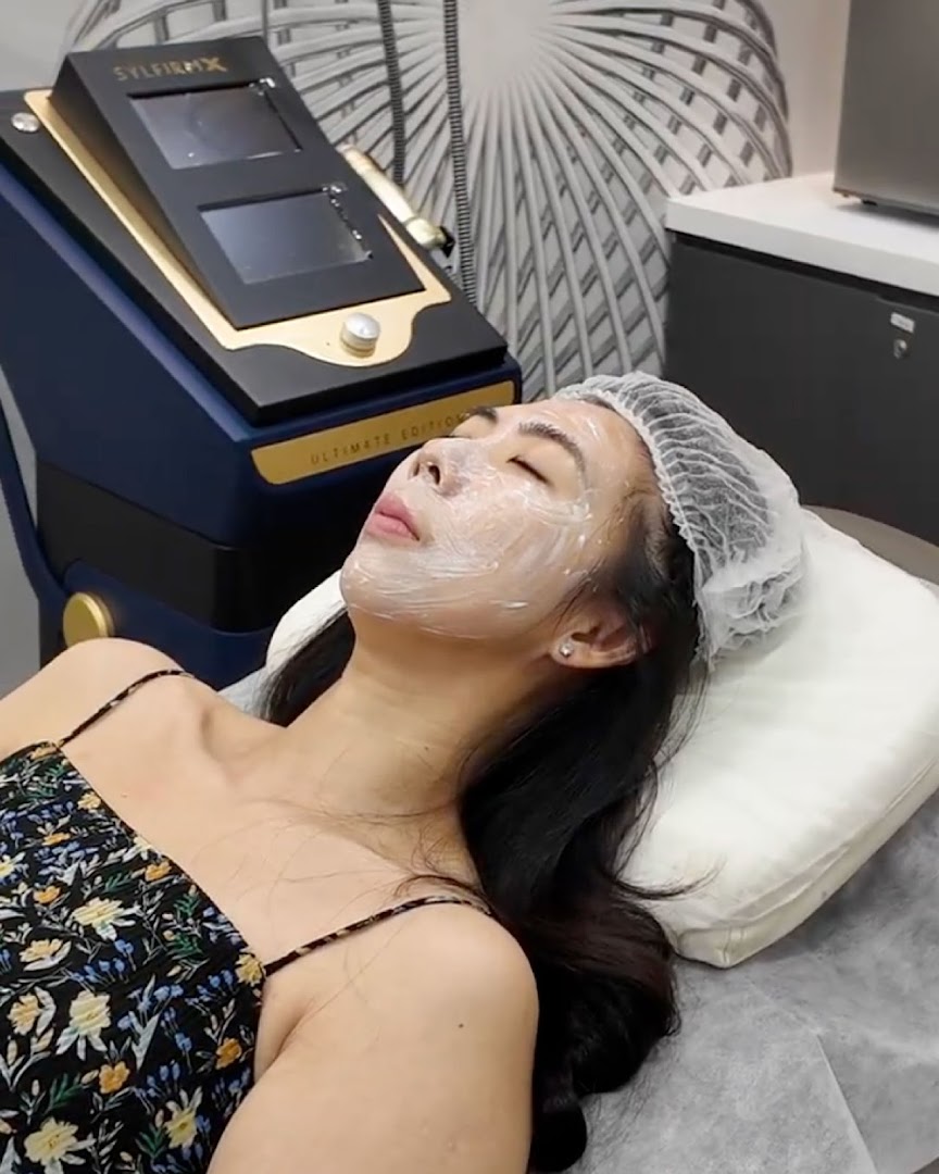 A woman receives a facial treatment with a mask at V Medical Aesthetics & Laser Clinic.