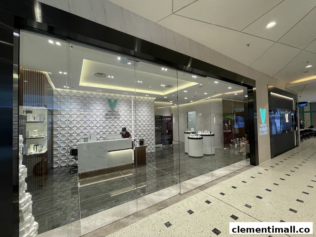 The modern glass shopfront of V Medical Aesthetics & Laser Clinic, featuring a bright reception area.
