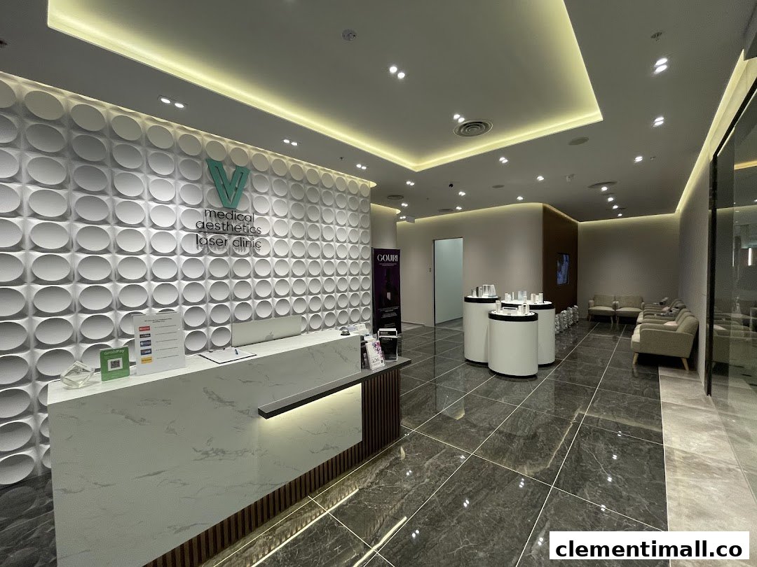 A modern and clean reception area with a waiting lounge at V Medical Aesthetics & Laser Clinic.
