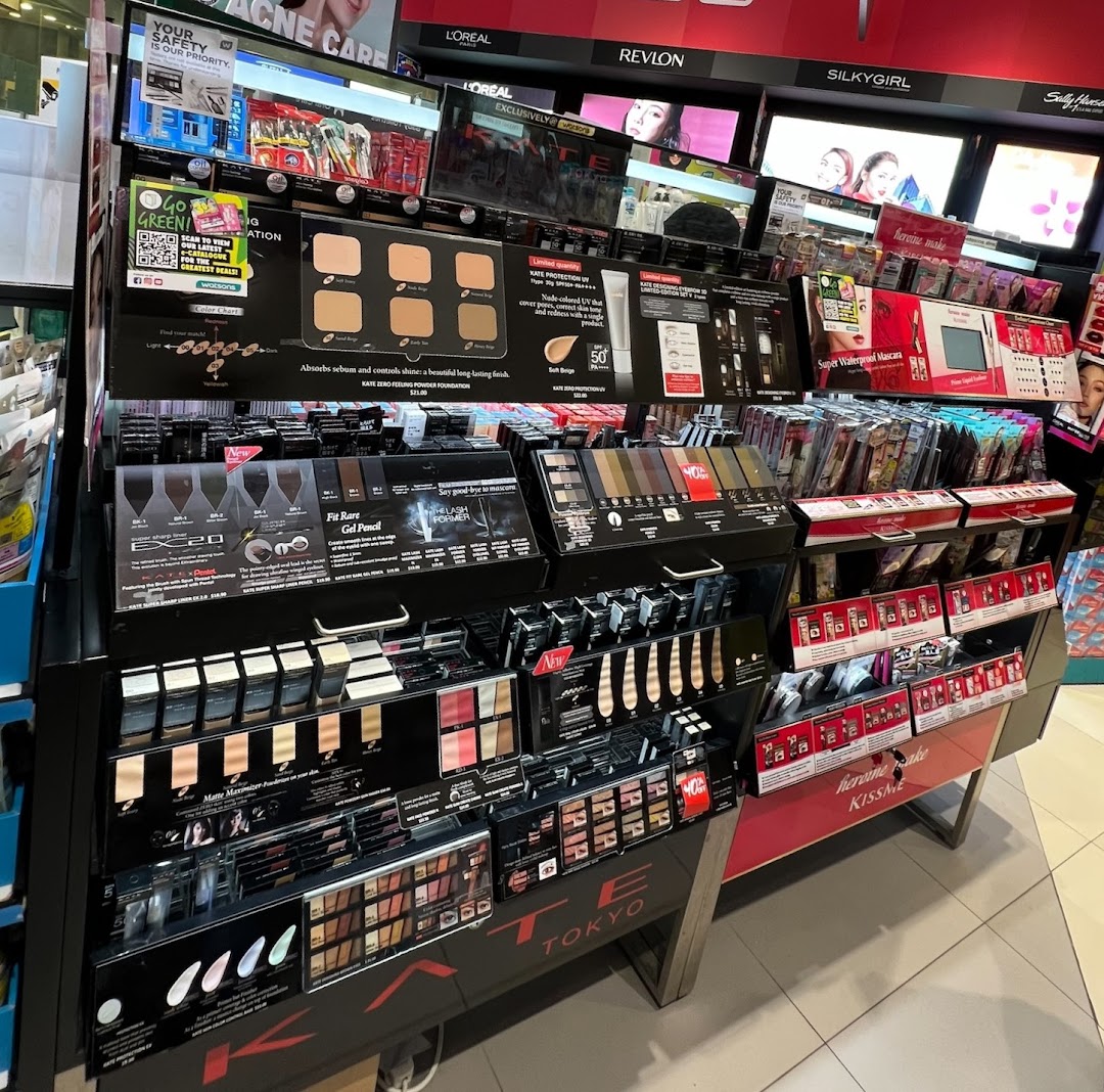 A vibrant in-store display showcasing a wide range of cosmetics and beauty products from various brands.