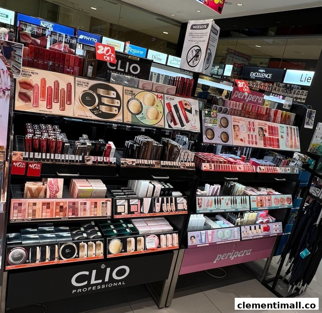 A vibrant display of cosmetics and beauty products from brands like Clio and Peripera inside Watsons.
