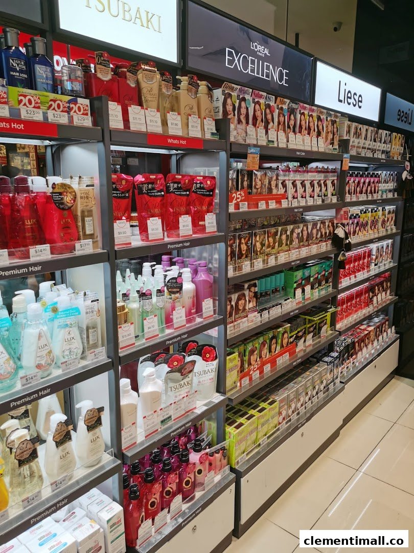 An aisle in Watsons showcasing a wide range of hair care products and hair dyes from various brands.