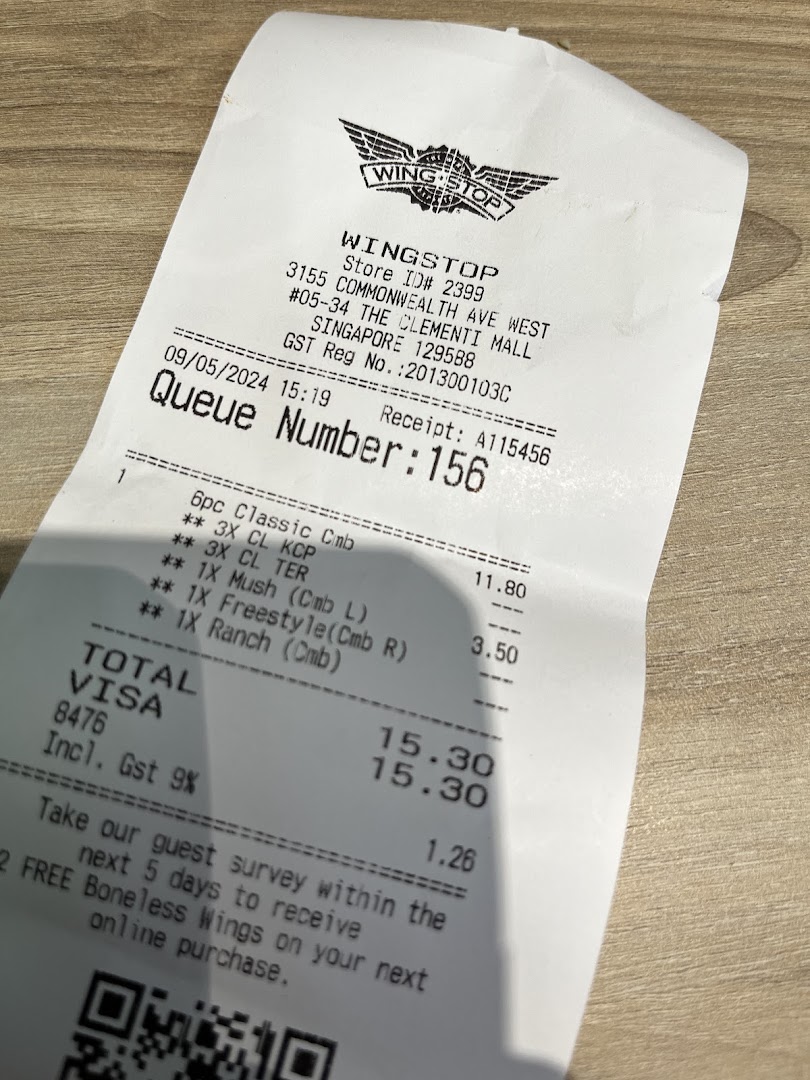 A detailed Wingstop receipt showing menu items, prices, and store information.