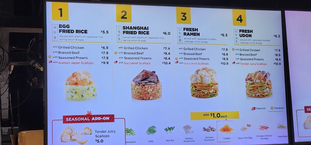 A digital menu board displaying various fried rice and noodle dishes with customizable protein options and add-ons.