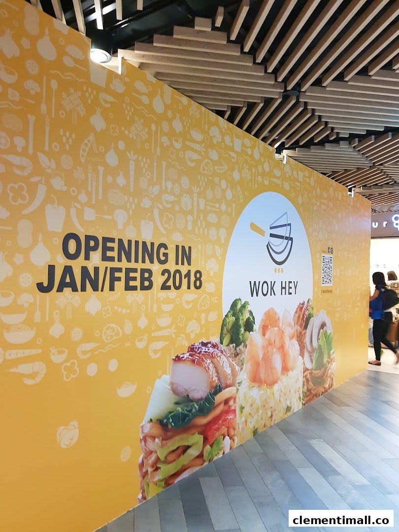 Construction hoarding for WOK HEY, announcing its opening in Jan/Feb 2018 at The Clementi Mall.