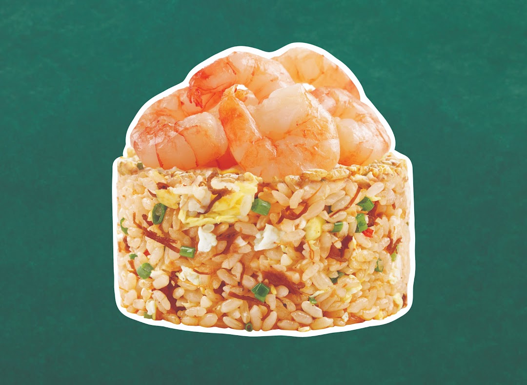 A vibrant image of shrimp fried rice, featuring fluffy rice, egg, and fresh prawns.