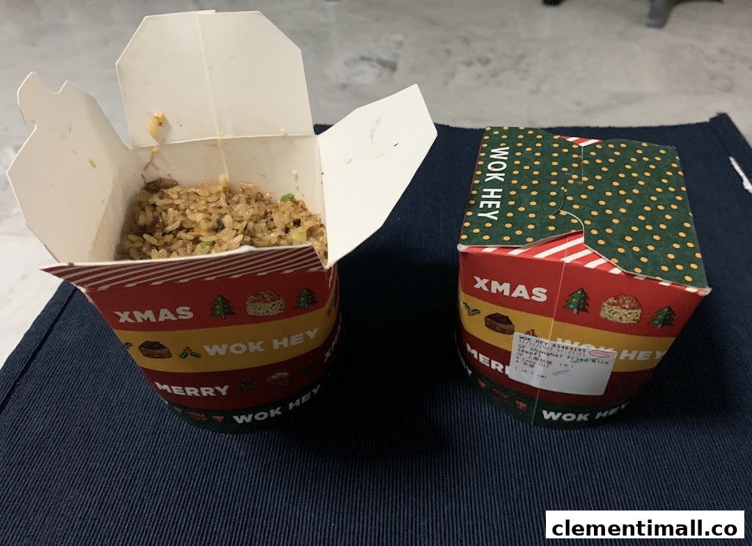 Two Wok Hey takeaway boxes, one open revealing delicious fried rice.