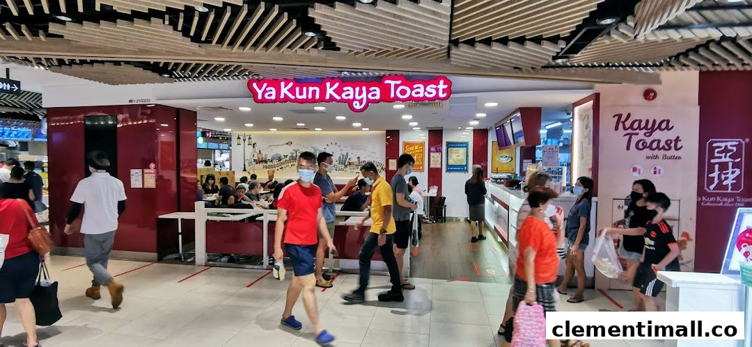 The bustling entrance of Ya Kun Kaya Toast, showcasing its inviting interior and customers.