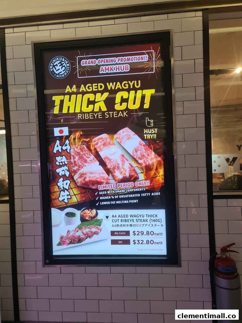 A vibrant promotional poster for Yakiniku Like's A4 Aged Wagyu Thick Cut Ribeye Steak.