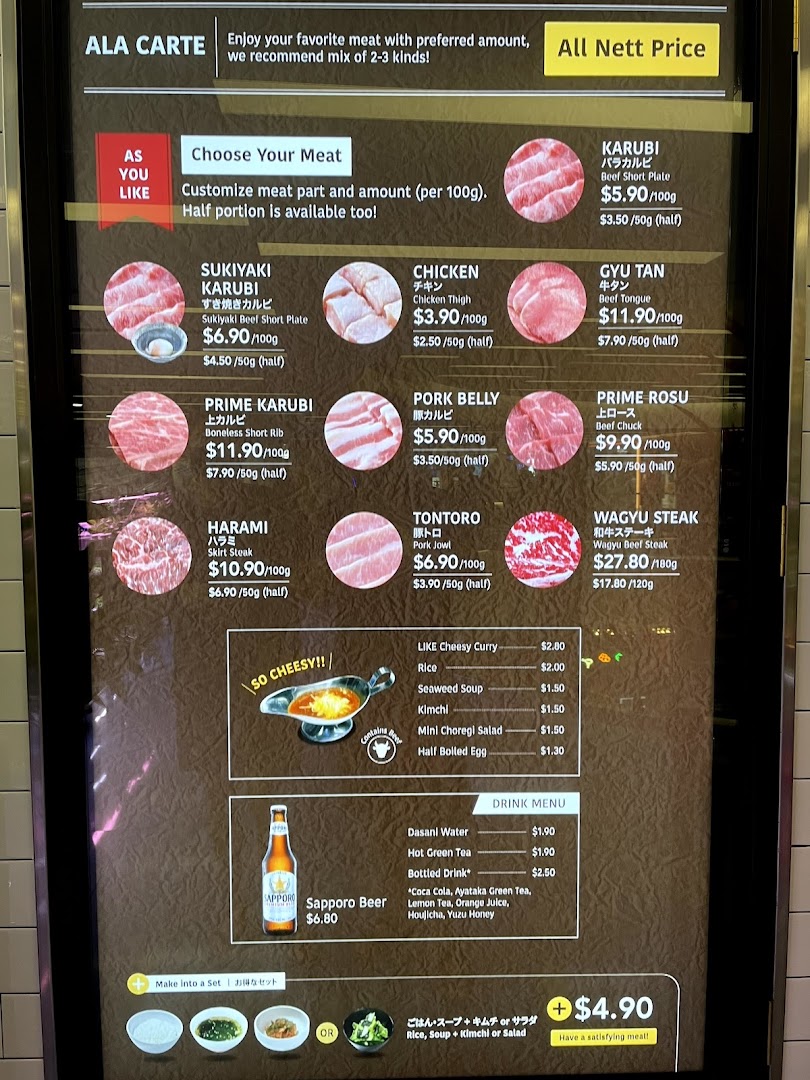 A detailed menu board for Yakiniku Like, featuring various meat cuts, sides, and drinks.