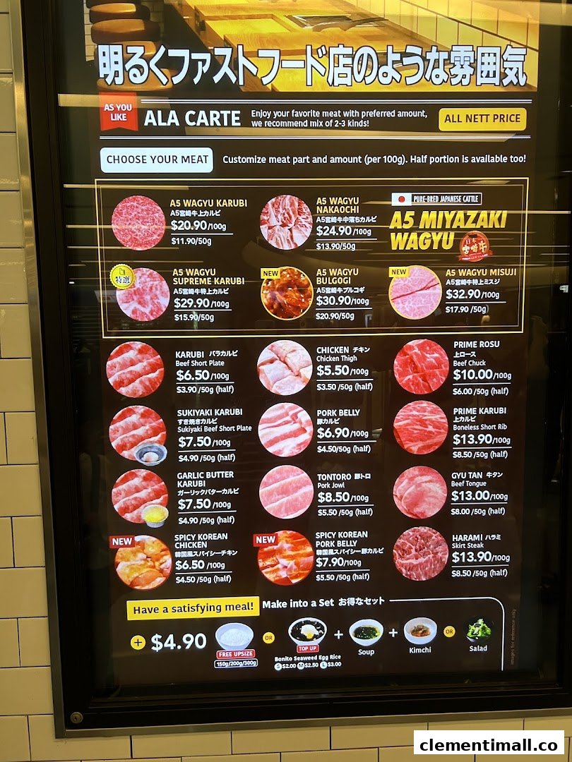 A detailed menu board displaying various cuts of premium wagyu and other meats with prices.