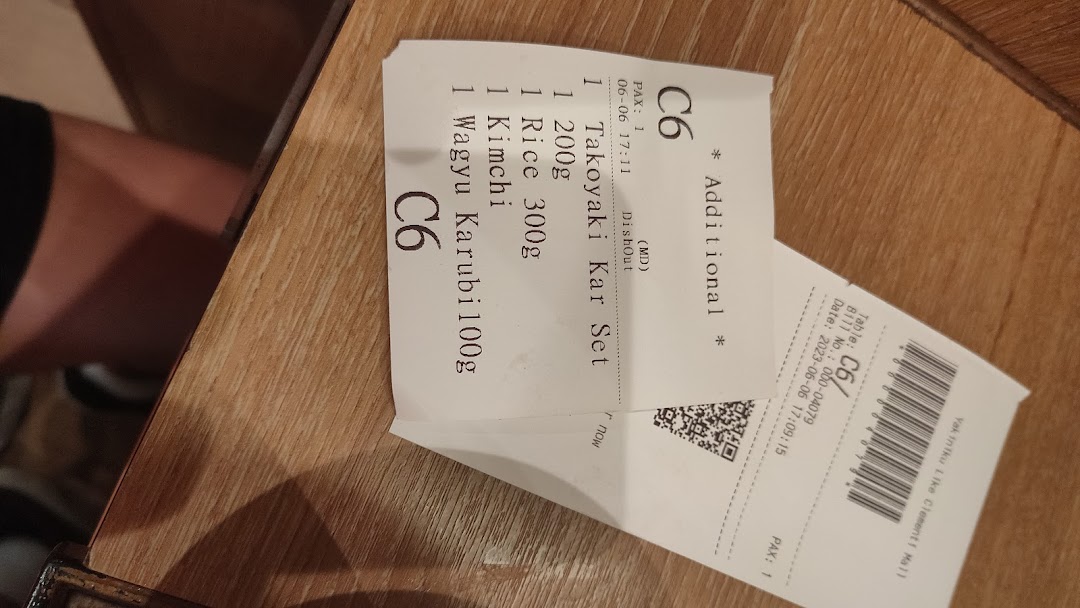 An order slip from Yakiniku Like, detailing a customer's food selections.