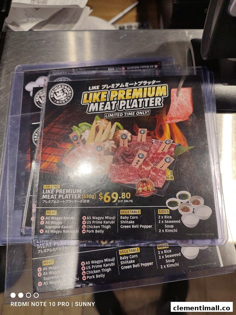 A promotional menu card for Yakiniku Like's 'LIKE PREMIUM MEAT PLATTER' with pricing and contents.