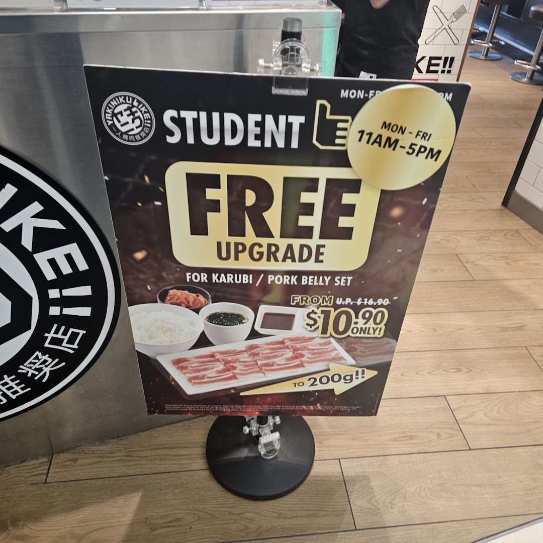 A promotional standee for Yakiniku Like, advertising a student deal for a Karubi/Pork Belly set.
